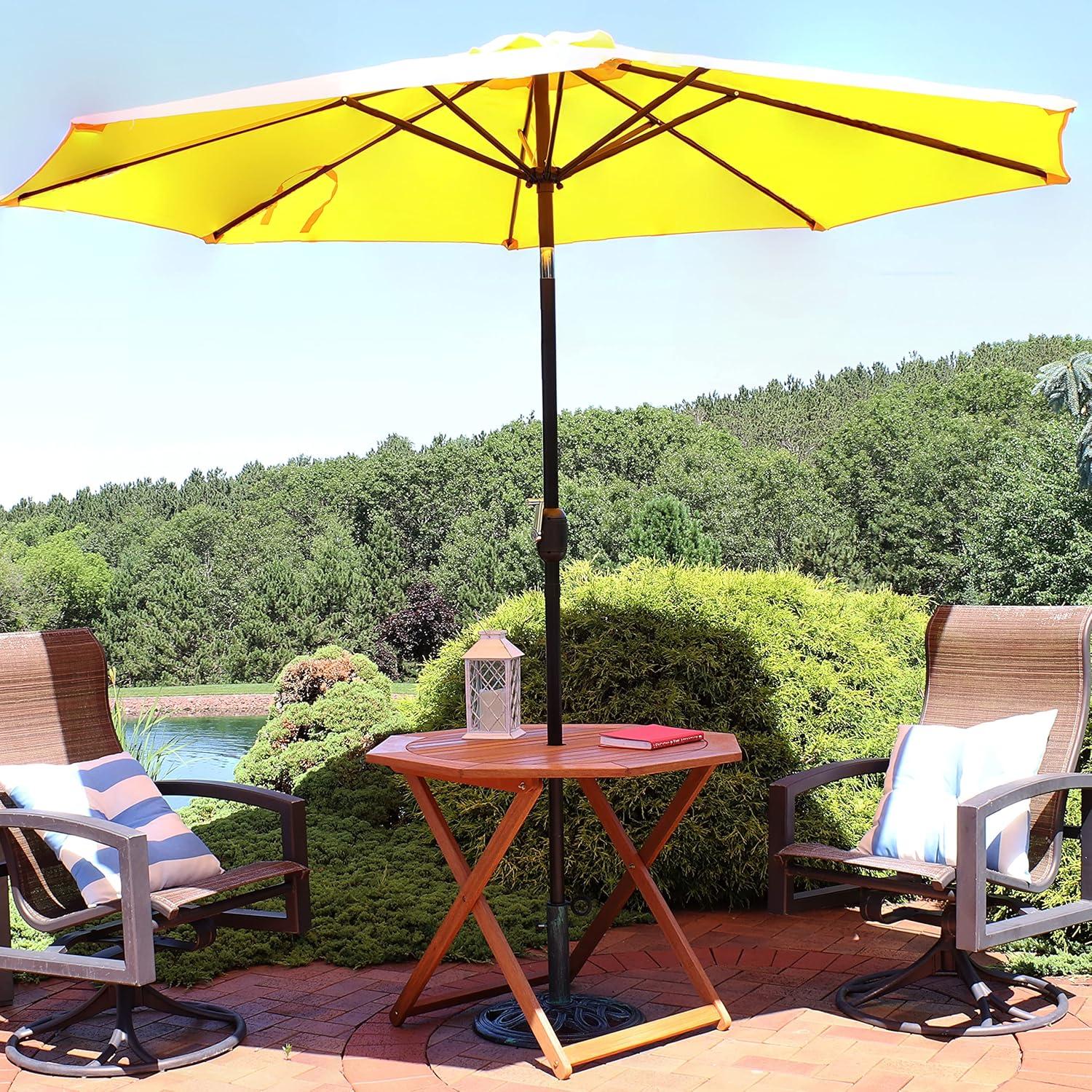 imageSunnydaze Folding Meranti Wood Outdoor Dining Table with Umbrella Hole Foldable Teak Patio Table Teak Oil Finish Octagon
