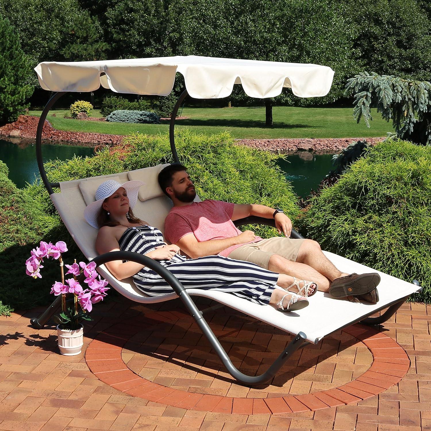 imageSunnydaze Outdoor Double Chaise Lounge with Canopy Shade and Headrest Pillows Beige Fabric with Black PowderCoated Frame
