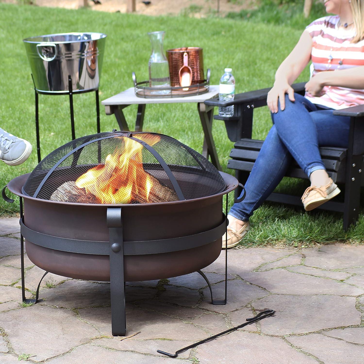 imageSunnydaze 29Inch WoodBurning Outdoor Fire Pit Bronze Cauldron Wood Fire Pit for Outside Includes Poker and Spark Screen