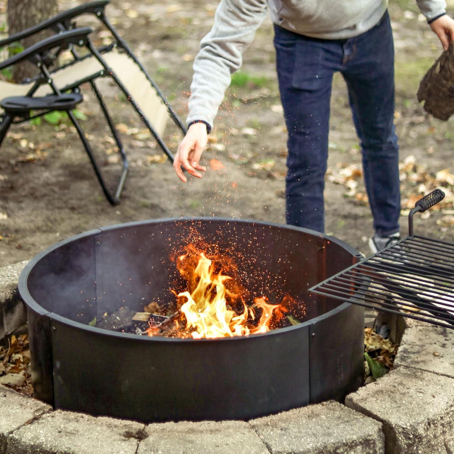 image:imageSunnydaze Outdoor Fire Pit Ring HeavyDuty Round Steel Fire Ring with Cooking Grate and Poker 36Inch Outer34Inch Inner Diameter