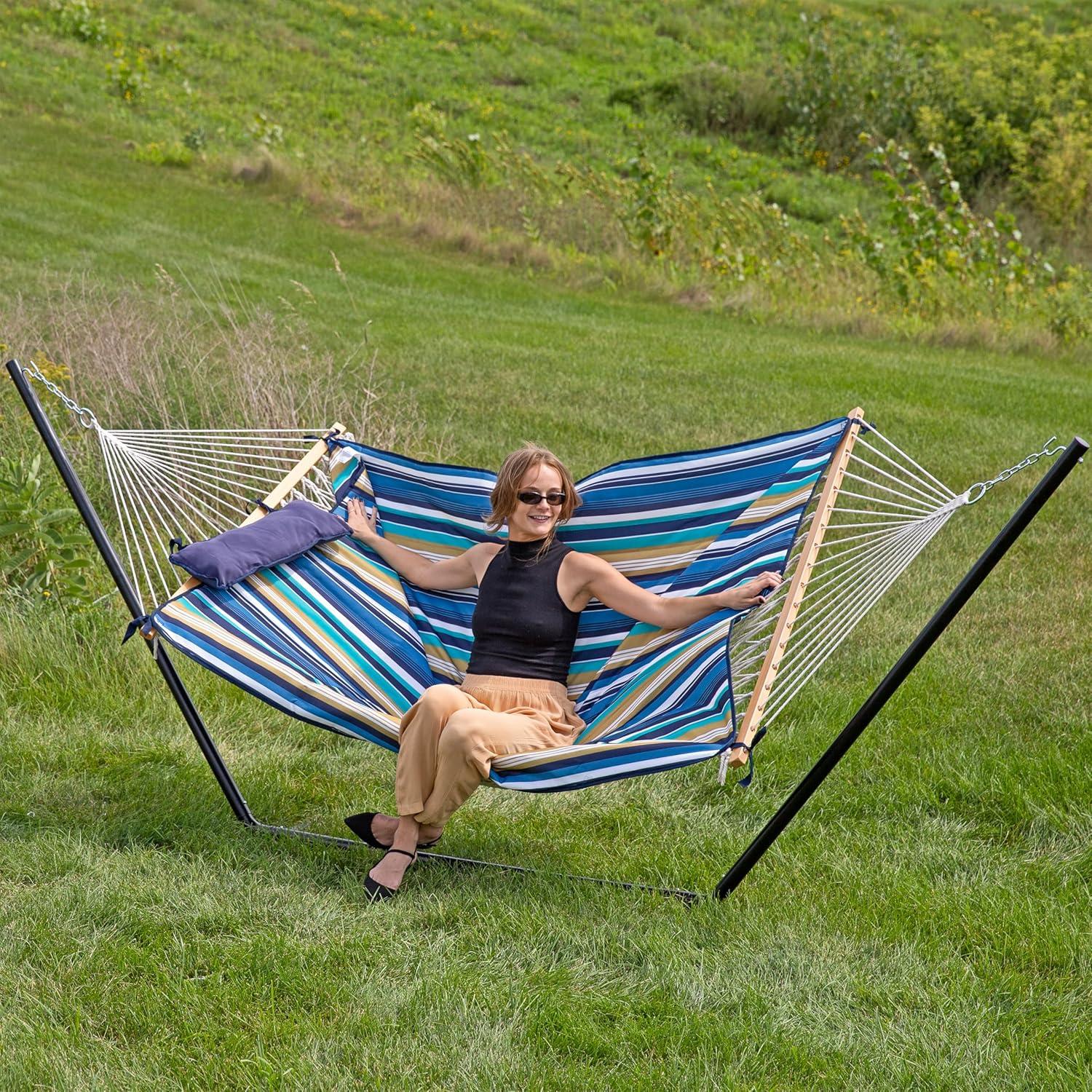 image:imageSunnydaze Rope Hammock with Stand for Outside 275Pound Capacity Includes 12Foot Hammock Stand Spreader Bar Pad and Pillow Modern LinesLakeview