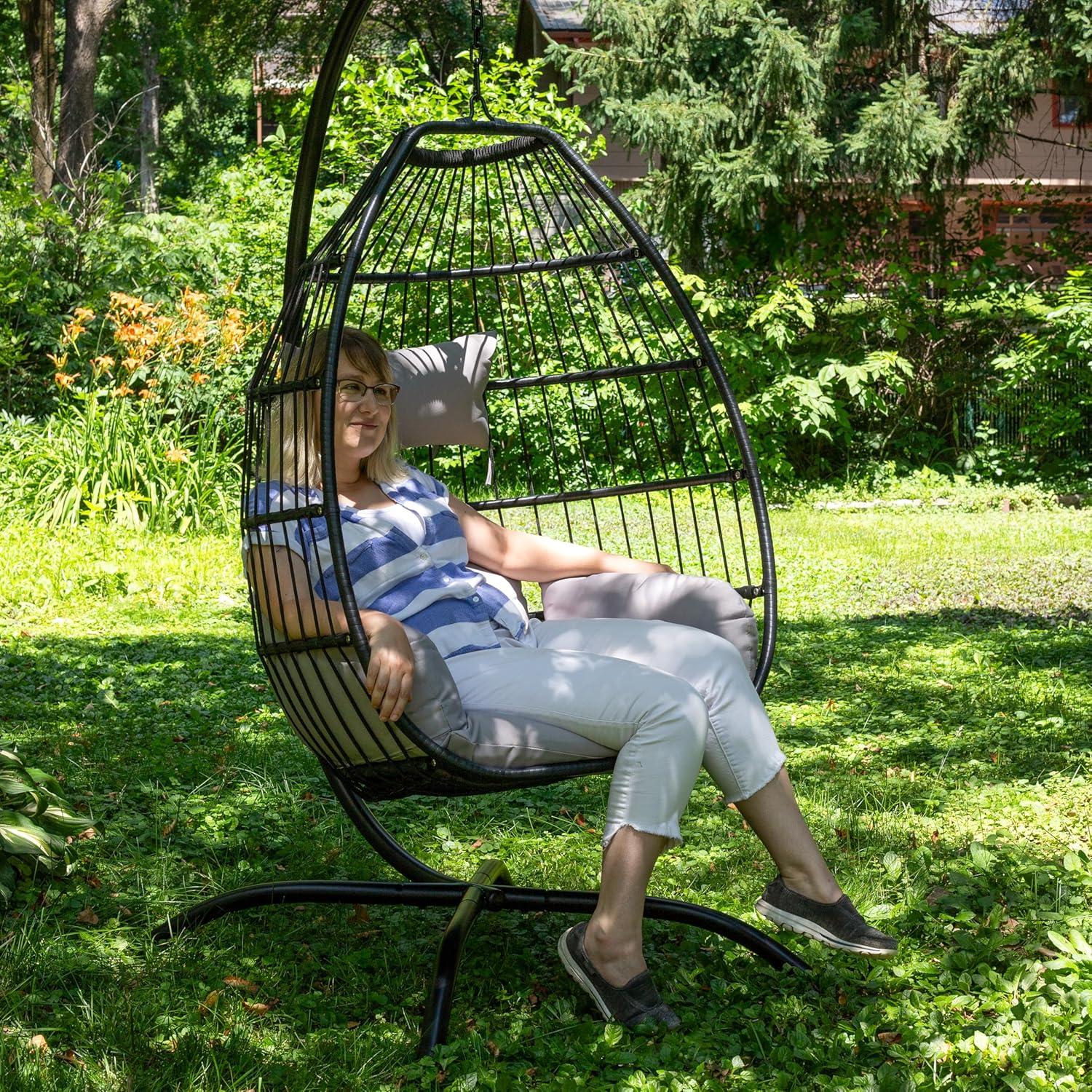 image:imageSunnydaze Delaney Black Resin Wicker Hanging Egg Chair with PowderCoated Steel Stand Gray Polyester Cushions 81 Inches H