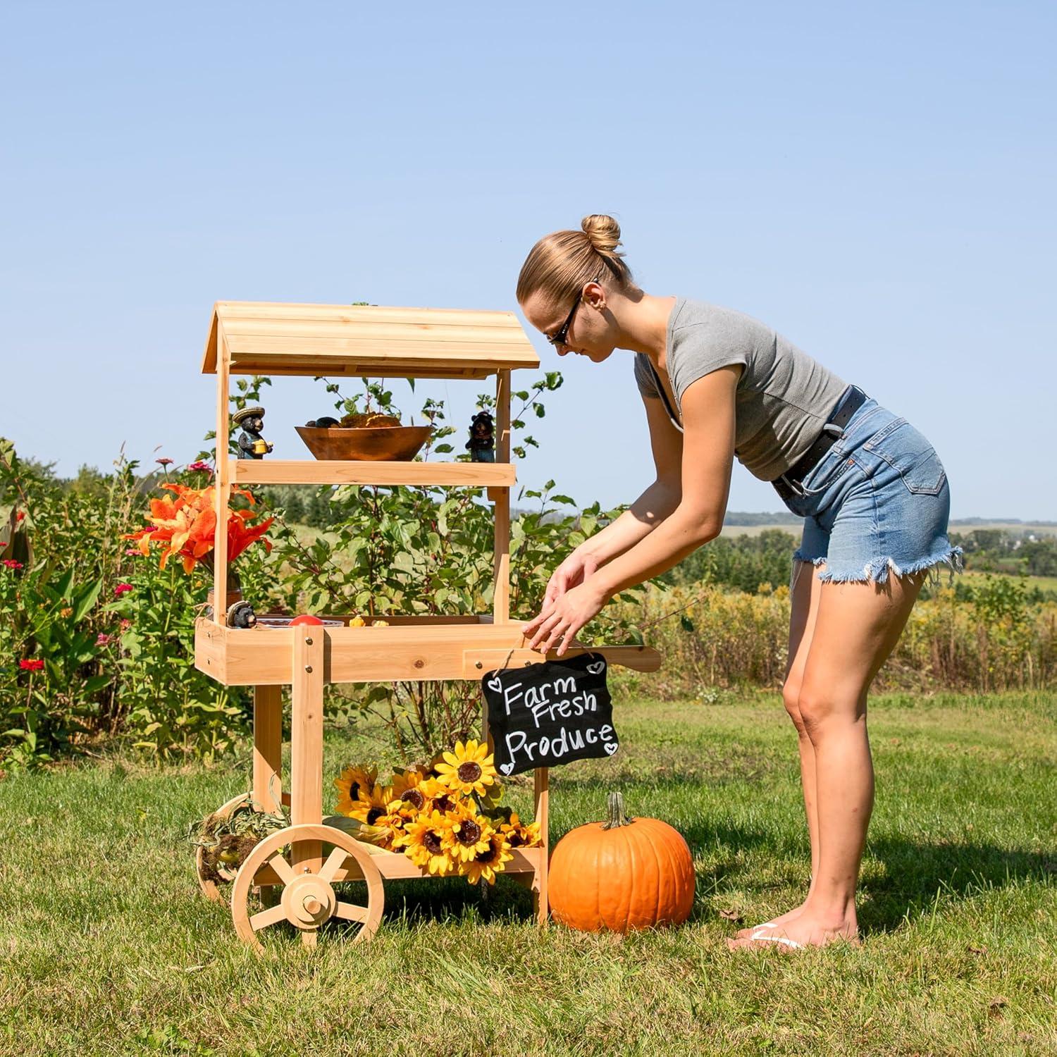 image:imageSunnydaze Country Market Flower Cart Display Stand with Wheels 2 Shelves Fir Wood 30 lb Weight Capacity Natural FirNatural Fir