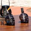 Sunnydaze Grinning Skull Glass Tabletop Torches – Outdoor Patio Lighting – Includes Wicks and Attached Snuffers – Set of 16 Refillable Torches – Clear(Black)