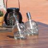 Sunnydaze Grinning Skull Glass Tabletop Torches – Outdoor Patio Lighting – Includes Wicks and Attached Snuffers – Set of 16 Refillable Torches – Clear(Clear)
